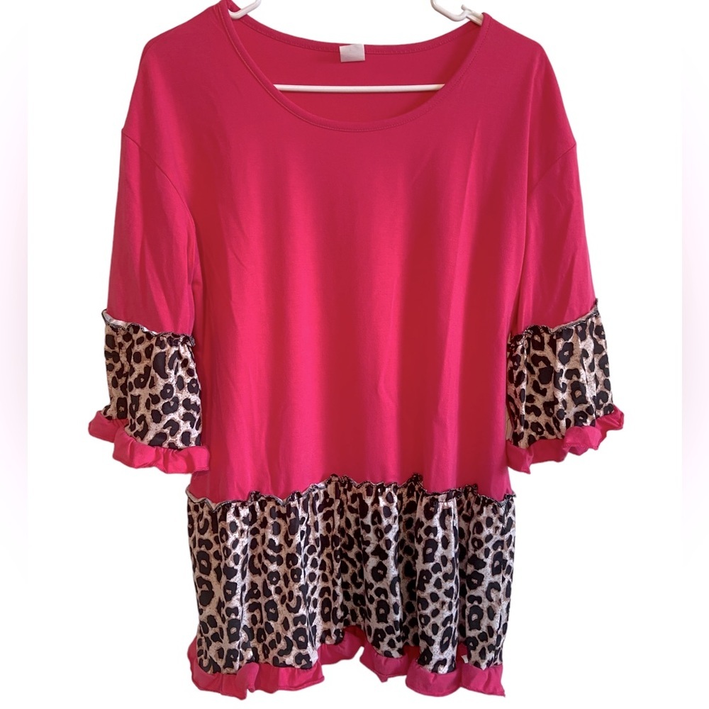 Hot pink oversized blouse with animal print accents. 3/4 length sleeves. Size L